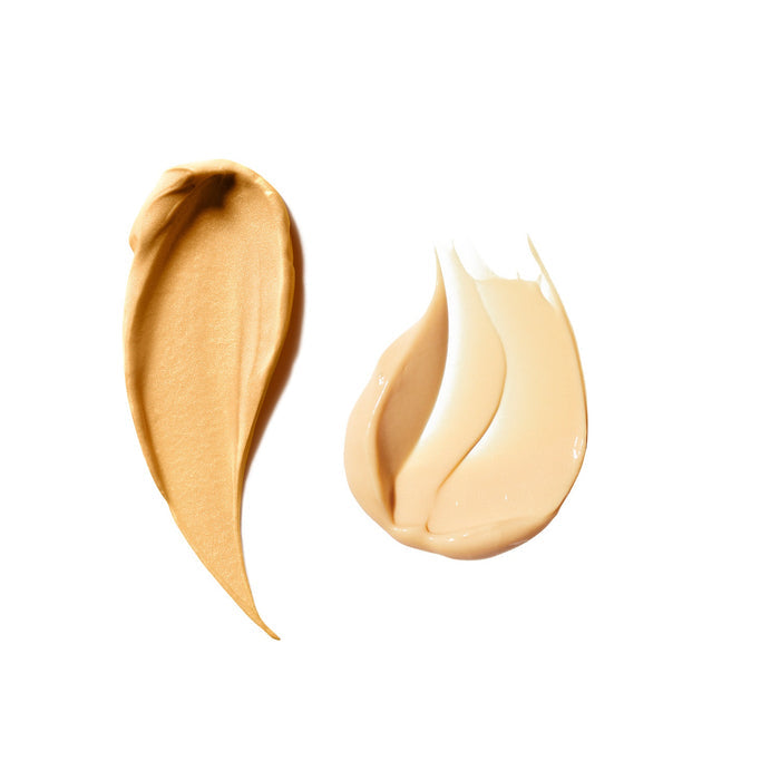 Smears of Banana Bright Face Primer and Banana Bright+ Eye Crème shown on a white background.