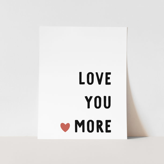 Card with 'LOVE YOU MORE' text and a heart on a white background