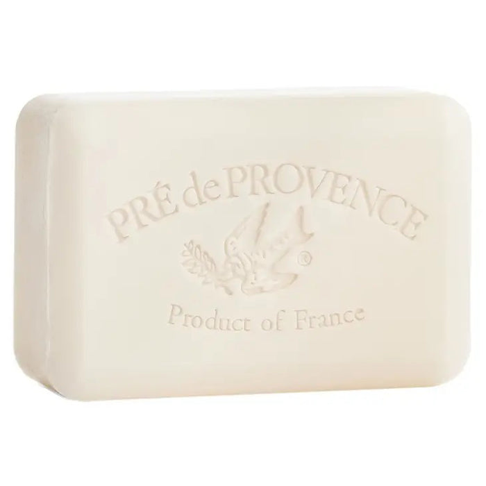 A rectangular off-white MILK BAR SOAP 250G by EUROPEAN SOAPS, LLC, enriched with shea and embossed with "PRÉ de PROVENCE Product of France" plus a bird carrying an olive branch.