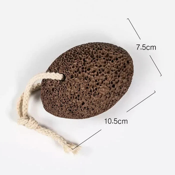 Brown pumice stone with a rope on a white background, showing measurements.