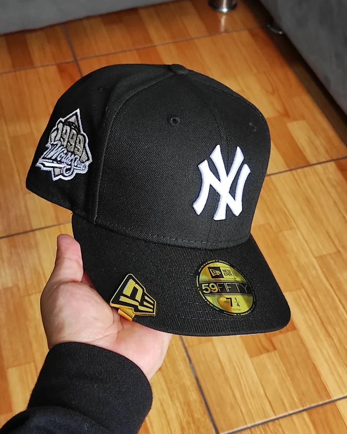New Era New York Yankees World series 1999 black / pink 59fifty fitted
