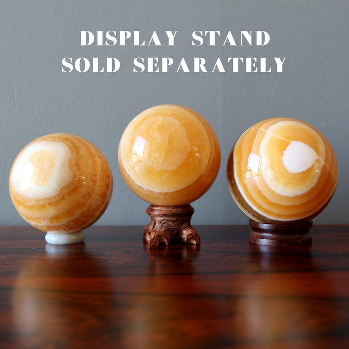 orange calcite spheres on ball stands