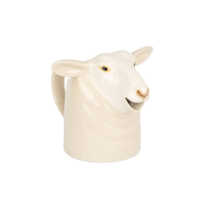 The QUAIL CERAMICS - WHITE SUFFOLK SHEEP JUG by QUAIL DESIGNS is a sheep-shaped ceramic jug, off-white with painted details, featuring a handle and top opening—ideal for adding farmhouse charm to your kitchen.