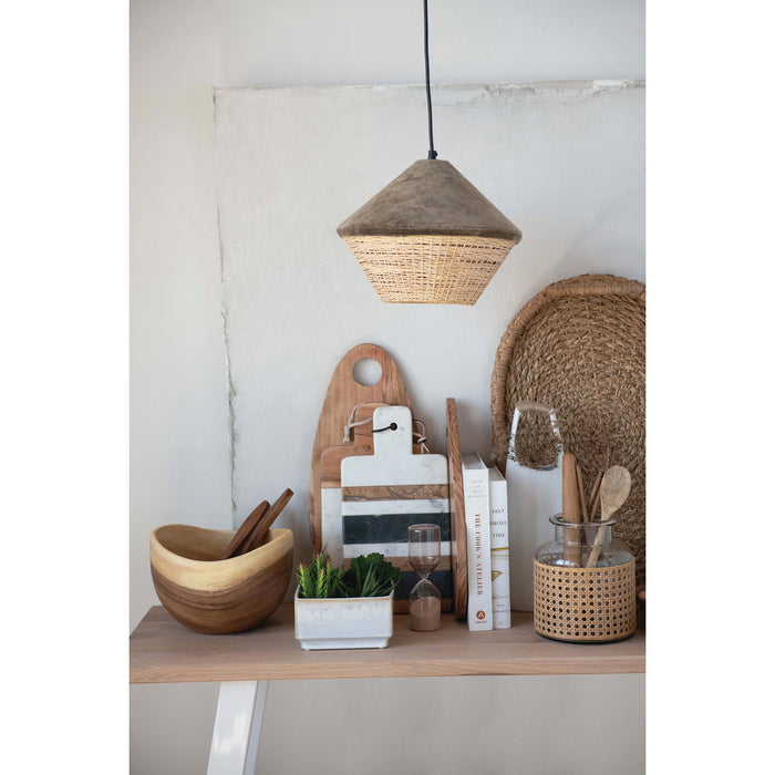 The CREATIVE COOP STONEWARE VASE WITH RATTAN WRAPPED HANDLE in white features a tall, minimalist design with a narrow neck and a rattan-wrapped handle, making it a striking decorative accent for any space.