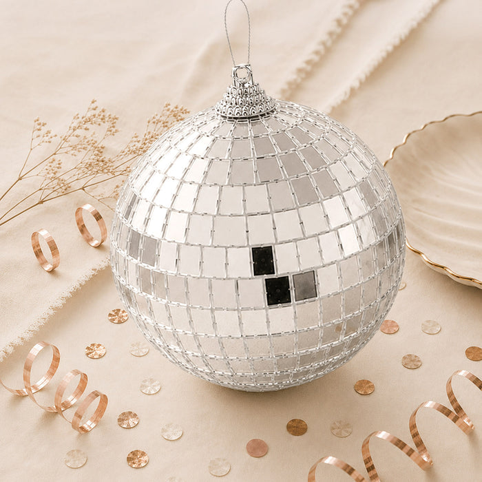 Silver mosaic disco ball ornament with reflective tiles and rose gold decor