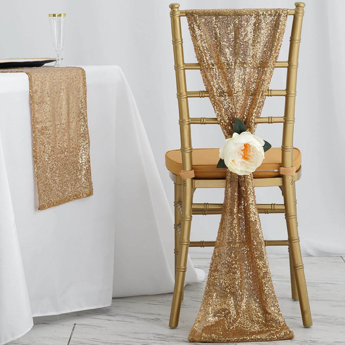 Gold sequin chair sash with flower decoration on a gold Chiavari chair.