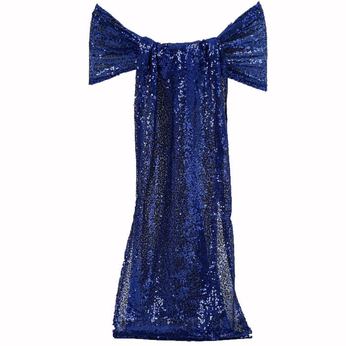 Blue sequin dress with a bow detail on a plain background #whtbkgd