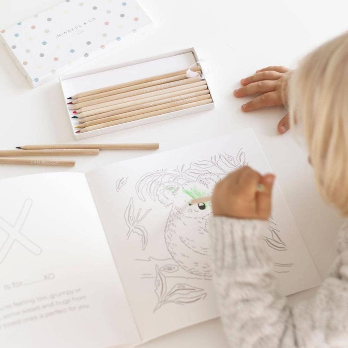 Child using Affirmation Colouring Pencils to colour a creative illustration, promoting mindfulness and positivity.