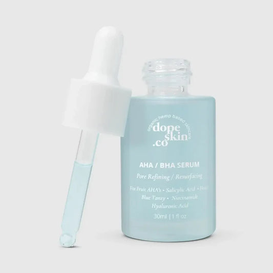 Dope Skin Co. AHA/BHA serum bottle with dropper on a light gray background
