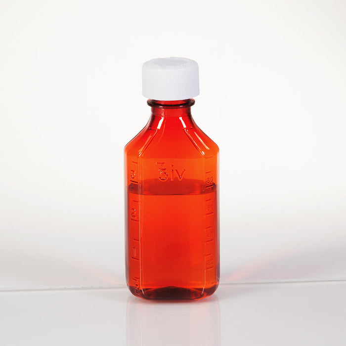 A small, amber plastic bottle sits on a white surface. It is partially filled with a translucent, amber liquid and has a white child-resistant cap.