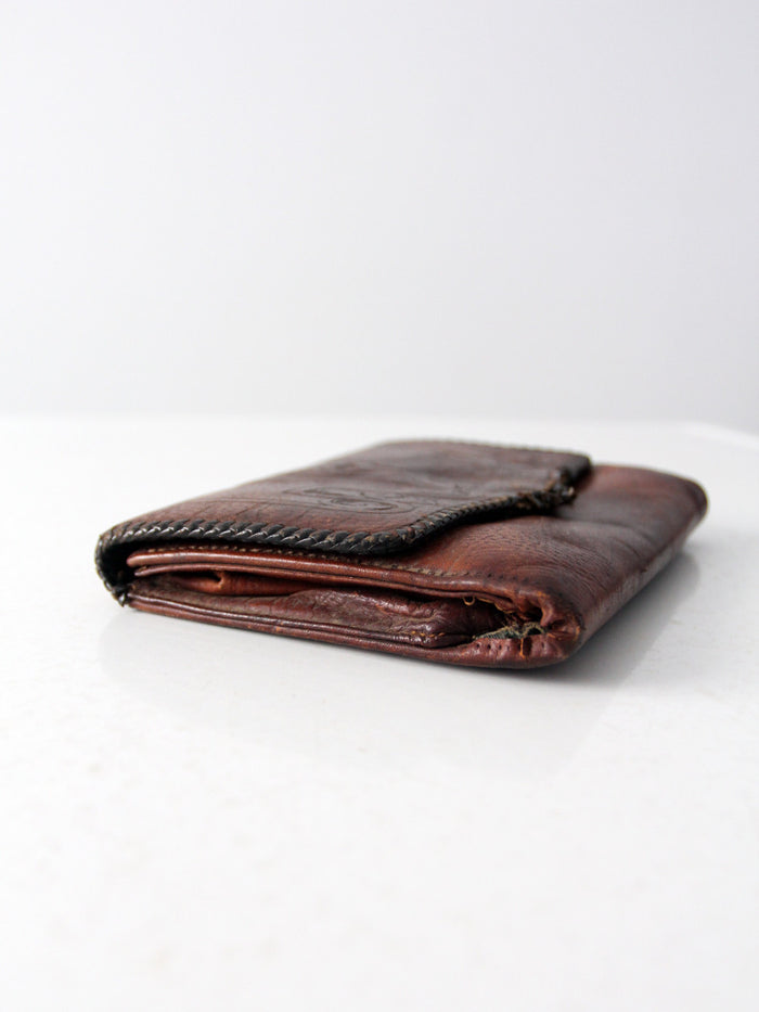 antique leather clutch with art nouveau tooling
