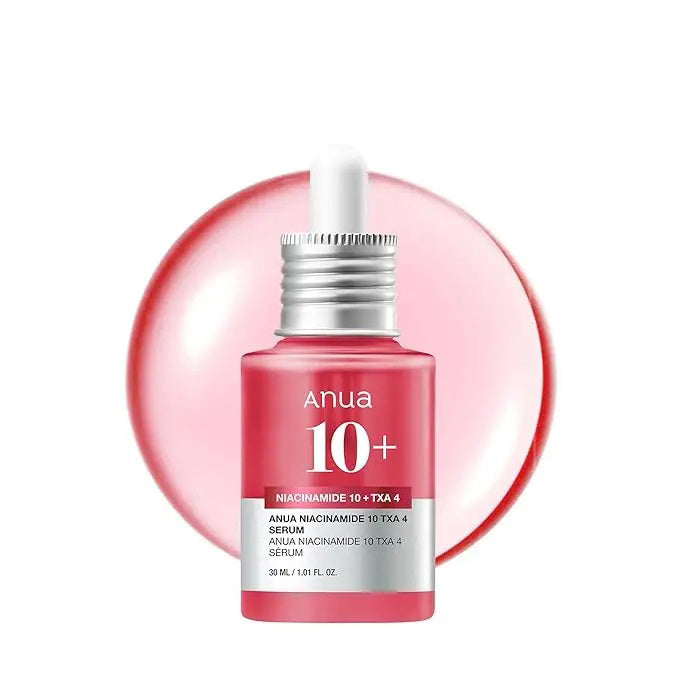 A pink dropper bottle of GLOWISS ANUA 10+ NIACINAMIDE SERUM 30ML is displayed before a glossy pink droplet, emphasizing this niacinamide and tranexamic acid serum on a clean white background.