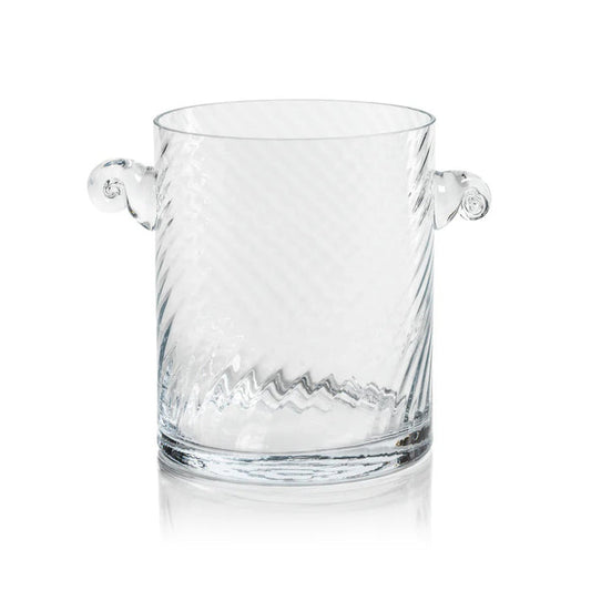The BAGATELLE SWIRL GLASS ICE BUCKET by ZODAX features a clear, textured spiral design with diagonal swirls and two round handles—a modern bar accessory shown on a white background.