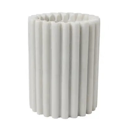 The BE HOME - WATERLOO MARBLE BOTTLE HOLDER by BE HOME, INC features white marble with vertical ridges, resembling a modern vase—an elegant and stylish wine accessory for any setting.