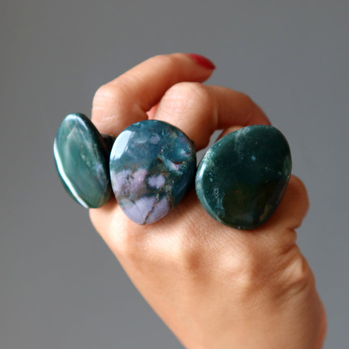 three bloodstone statement rings on hand