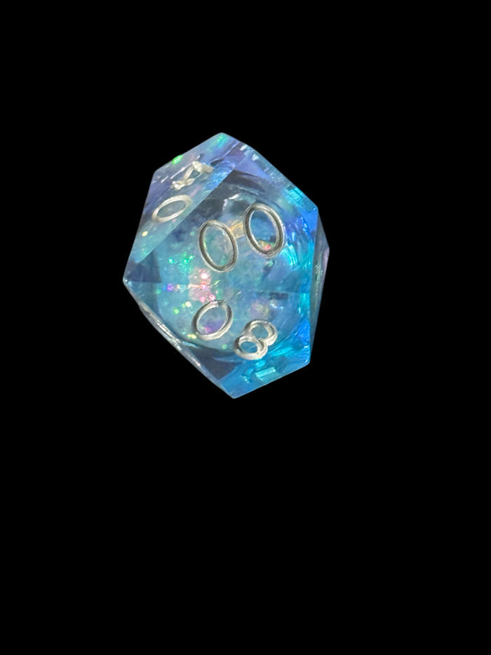 7-piece blue and purple prismatic cosmos dice set with glitter, D&D polyhedral set – Raven's Cauldron, 6 N Sandusky St, Delaware, OH 43015