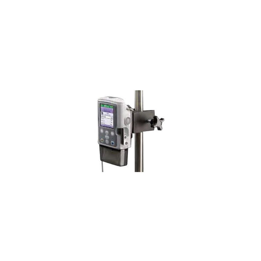 A medical device with a screen is attached via a clamp to a pole. The device appears to be a pump or similar apparatus. The setting is clinical.