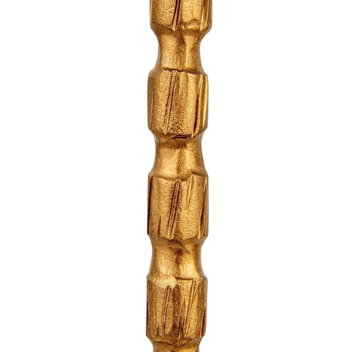 The CREATIVE COOP CAST IRON TAPER HOLDER IN BRASS FINISH, LARGE, features a tall, slender design with a textured segmented stem and round base, perfect for displaying a single taper candle.