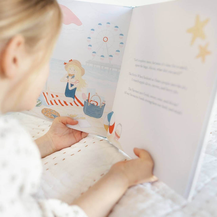 Child enjoying Charlie's Mindful Adventures By The Sea, exploring mindfulness through a colorful seaside tale.
