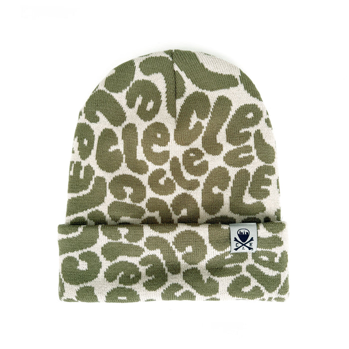 Green and white beanie with 'Dole' pattern on a white background