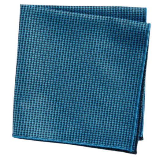 The CLIFTON WILSON Teal Houndstooth Cotton Pocket Square, made in the USA, is neatly folded and displayed on a white background.