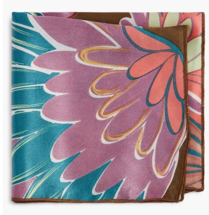 The CLIFTON WILSON Brown Floral Silk Pocket Square features a bold abstract floral print in pink, teal, coral, and brown with brown edges—a striking formal accessory for any suit.