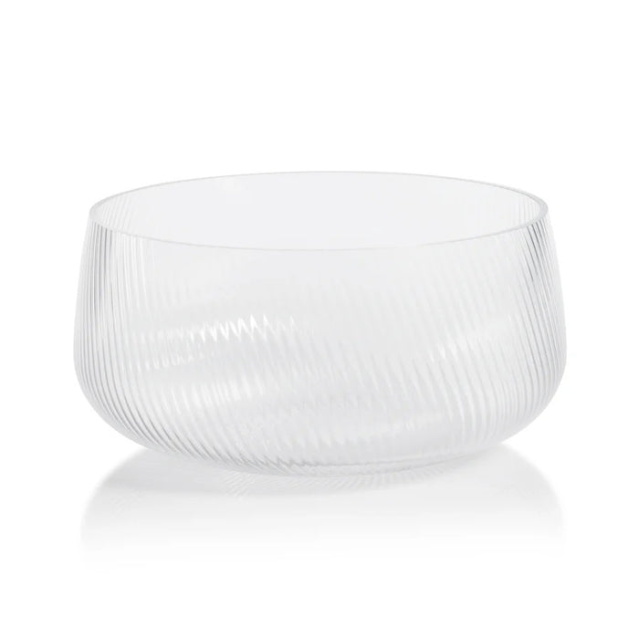 The ZODAX CONNAUGHT RIPPLED GLASS BOWL - LARGE is a clear, round glass bowl with a subtle diagonal ribbed pattern, measuring 10.75 in x 5 in, shown on a white background.