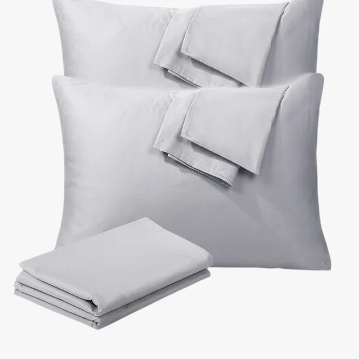 A 2-pack of light grey Cotton Co 400 Thread Oxford 50x90 pillowcases, one covering a pillow and another folded.