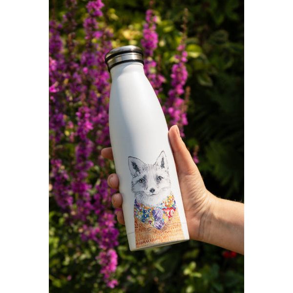 Hand holding a white water bottle with a fox design against a floral background