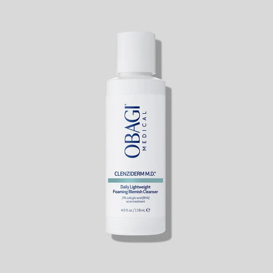 CLENZIDERM M.D. Daily Lightweight Foaming Blemish Cleanser white bottle on grey background