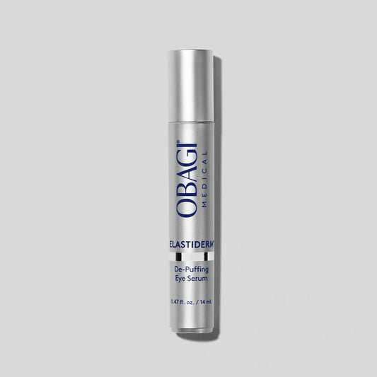 ELASTIDERM DE-PUFFING EYE SERUM BOTTLE IMAGE ON GREY BACKGROUND