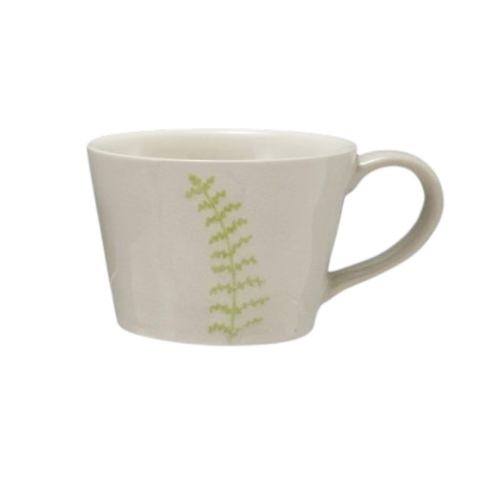 Four DEBOSSED STONEWARE MUGS WITH BOTANICAL PATTERN by CREATIVE COOP, featuring cream color, unique green botanical designs, and a subtle reactive glaze finish, are lined up side by side on a white background.
