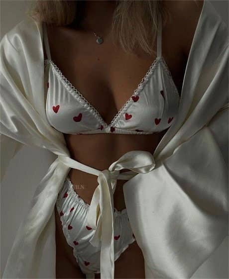 Satin White Lingerie Set with heart details, soft satin material elegantly styled with a robe.