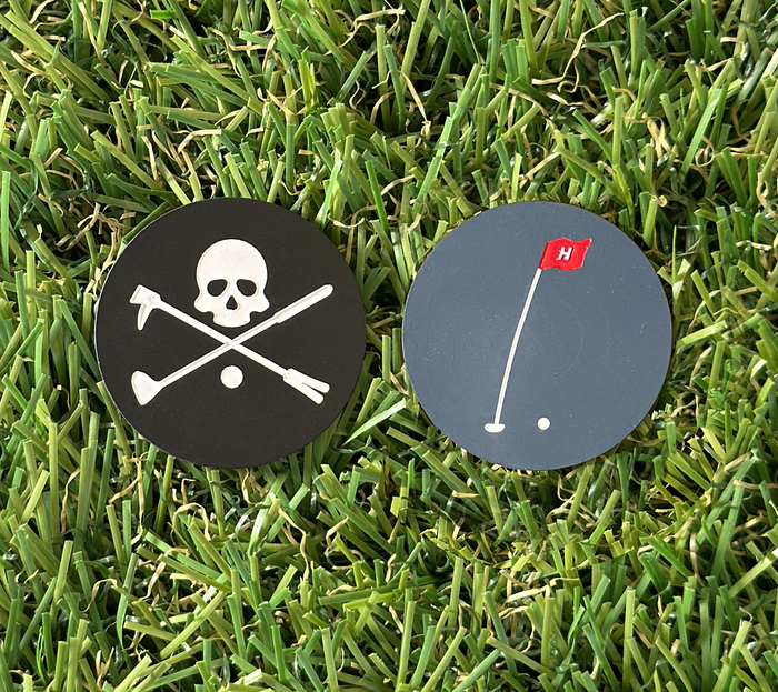 Double-Sided Hoolie Men's Golf Ball Marker with Roger skull design on one side and Pin Flag logo on the other.