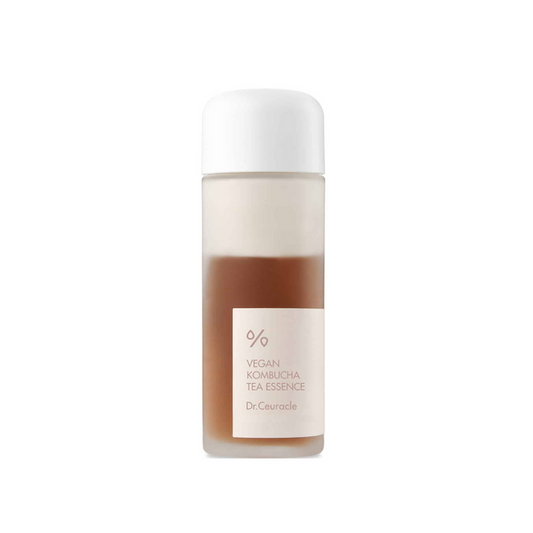 DR.CEURACLE Vegan Kombucha Tea Essence is a nutrient-rich, dual-phase essence that deeply hydrates and revitalizes the skin. Powered by Kombucha (Fermented Black Tea) and Green Tea Extract, it delivers a potent dose of antioxidants to help detoxify and strengthen the skin barrier. With added Ceramide NP, Centella Asiatica, and Sodium Hyaluronate, it soothes irritation, locks in moisture, and promotes a smooth, radiant complexion. Perfect for restoring balance and glow to dull, dehydrated, or str