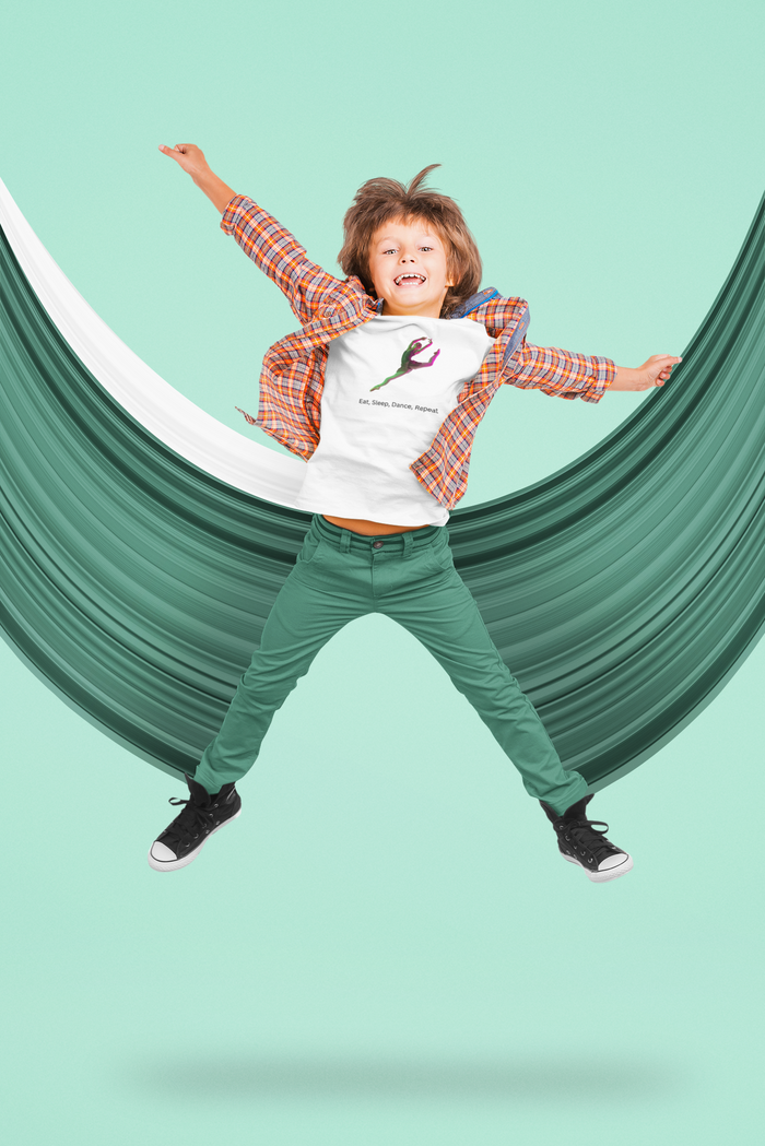Child jumping in a green hammock against a light blue background