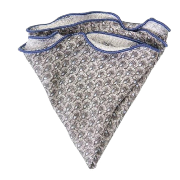The EDWARD ARMAH Silk Reversible Pocket Circle in Gray Foulard/Feather features a light gray geometric pattern with blue accents and border, shown folded on a white background.