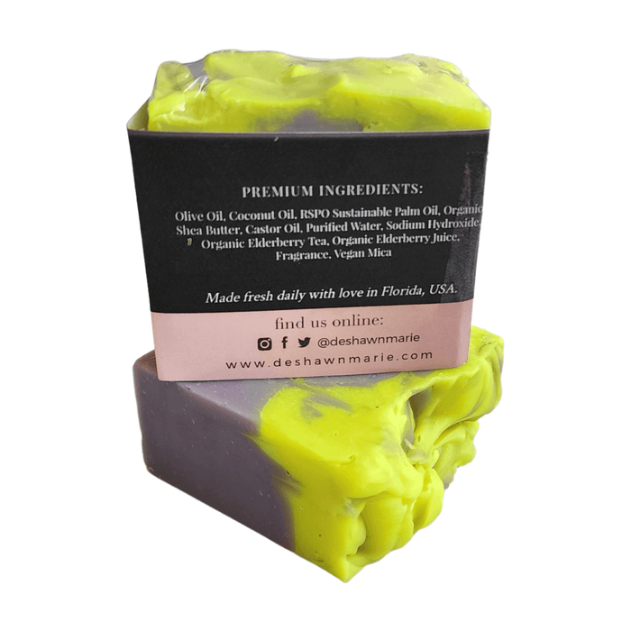 Elderberry Magnolia Soap Bar - Soap Boutique with vibrant yellow and violet swirls, featuring premium ingredients.