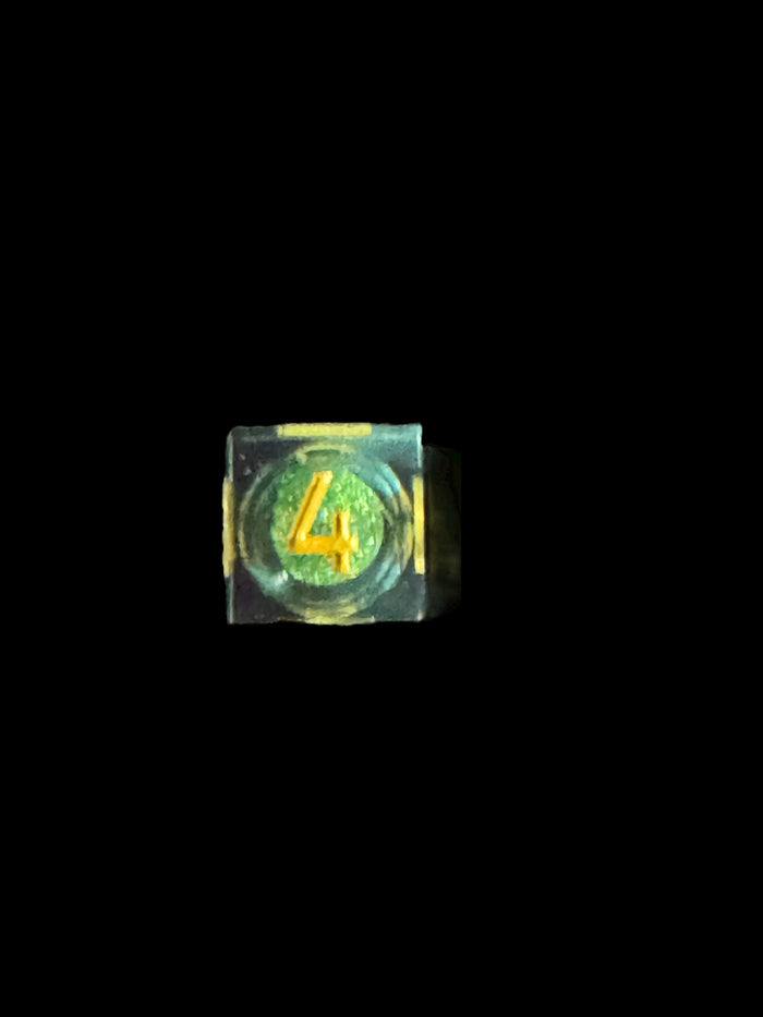 7-piece emerald green cosmos dice set with glitter swirl for D&D – Raven’s Cauldron, 6 N Sandusky St, Delaware, OH 43015