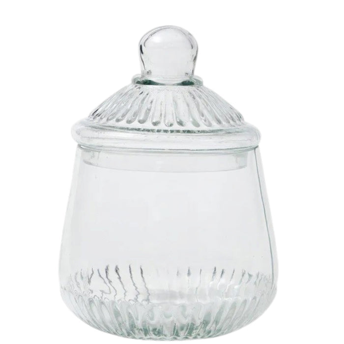 ETUHOME Bistro Glass Biscuit Jars with lids sit on a wooden tray, filled with snacks and orange-wrapped candies. The classic jar design by ETUHOME stands out against the softly blurred background.