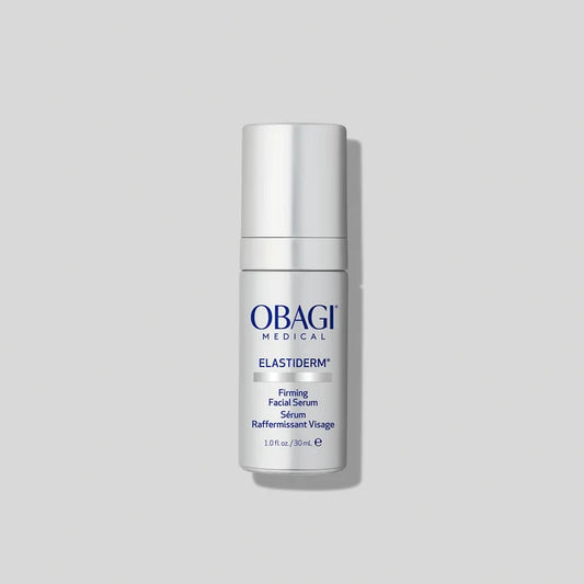 ELASTIDERM FIRMING FACIAL SERUM BOTTLE IMAGE ON GREY BACKGROUND