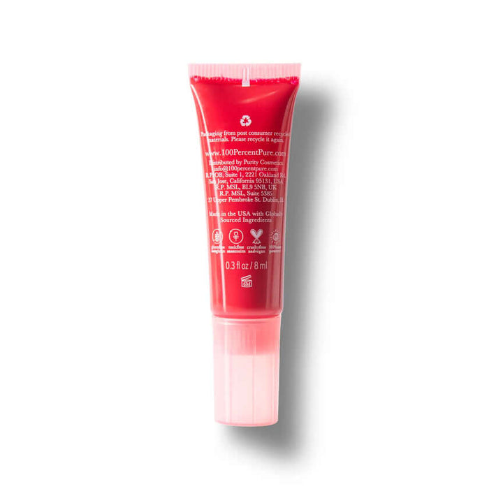 Red tube of lip balm on a white background
