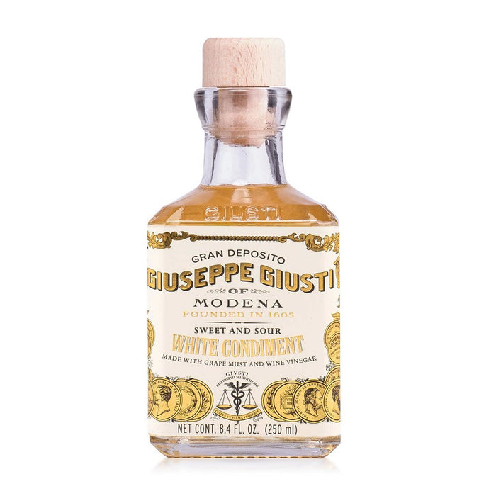 A clear 250ml bottle of MERCATO DI BELLINA's GIUSEPPE GIUSTI Italian White Wine Balsamic Vinegar, made with white wine vinegar and featuring a wooden cork and gold-white label highlighting its Modena, Italy heritage.