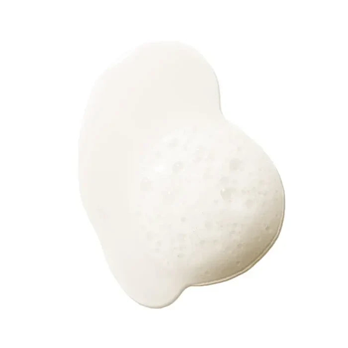 Repair Shampoo foamy texture showcasing its cleansing properties for restoring damaged hair.