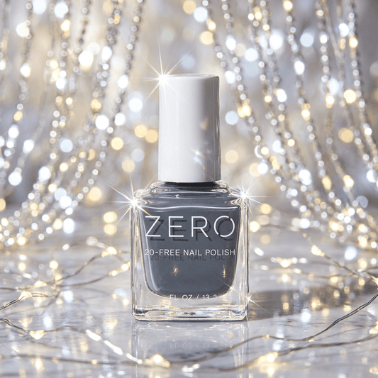 Bottle of ZERO nail polish on a glittery background