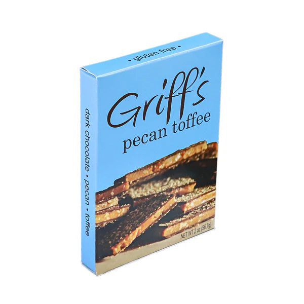 A blue box of GRIFF'S TOFFEE - PECAN TOFFEE 2OZ by GRIFFS TOFFEE, labeled gluten free, shows chocolate-covered pecan toffee on the front. The side says "dark chocolate • pecan • toffee." Net wt 2 oz (56.7g).
