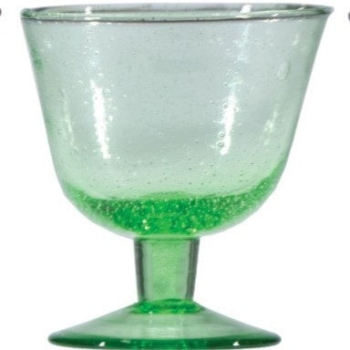 Four CREATIVE COOP HAND-BLOWN STEMMED SEEDED GLASSES in blue, amber, light green, and dark blue are displayed side by side on a white background, highlighting the charm of traditional glassmaking.
