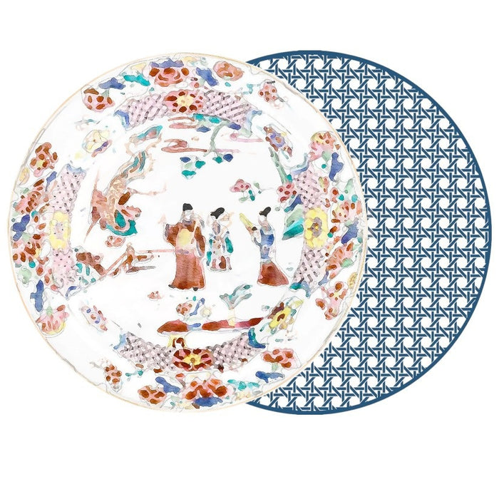 A decorative plate with traditional Asian motifs overlaps a blue geometric round plate, both elegantly displayed on the HOLLY STUART DESIGNS - ROUND CHINOISERIE GARDEN PLACEMAT by HOLLY STUART DESIGNS.