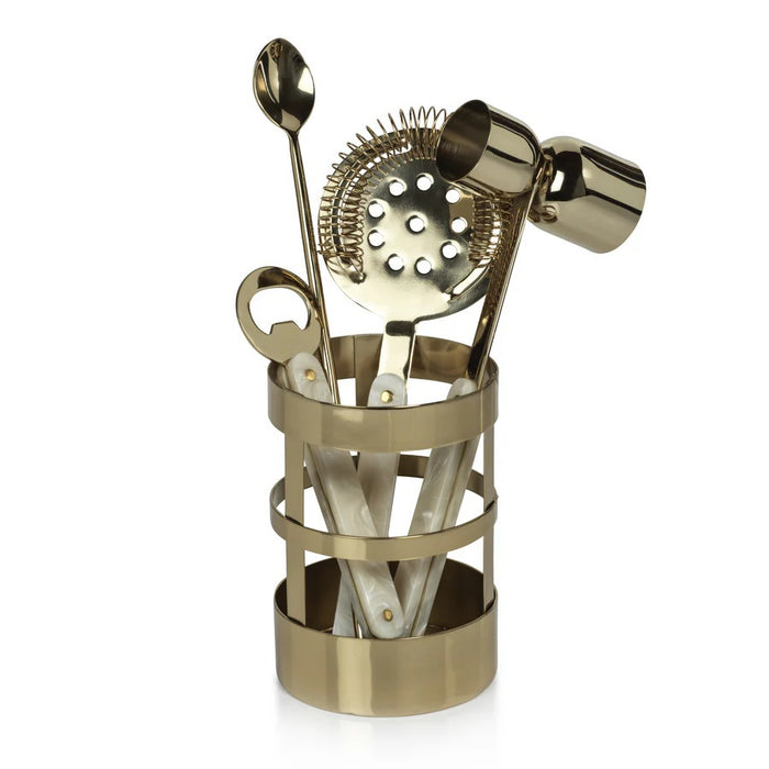 The KNIGHTSBRIDGE 5-PIECE BAR SET IN GOLD by ZODAX includes a strainer, jigger, bar spoon, and bottle opener with pearlescent handles—all in metallic gold—perfect for your cocktail hour. Elegantly displayed on a white background.