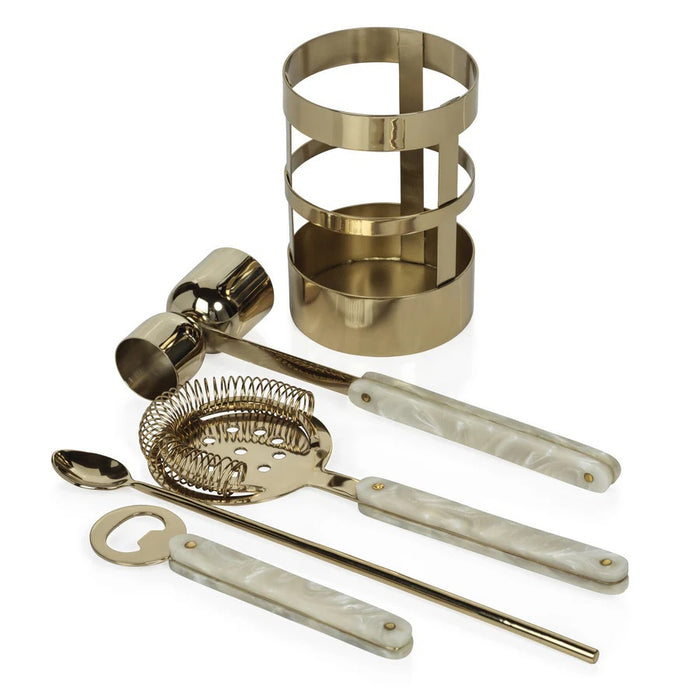 The KNIGHTSBRIDGE 5-PIECE BAR SET IN GOLD by ZODAX includes a strainer, jigger, bar spoon, and bottle opener with pearlescent handles—all in metallic gold—perfect for your cocktail hour. Elegantly displayed on a white background.